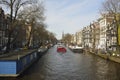 View of Prinsengracht canal towards Westerkerk from Berensluis bridge in Amsterdam